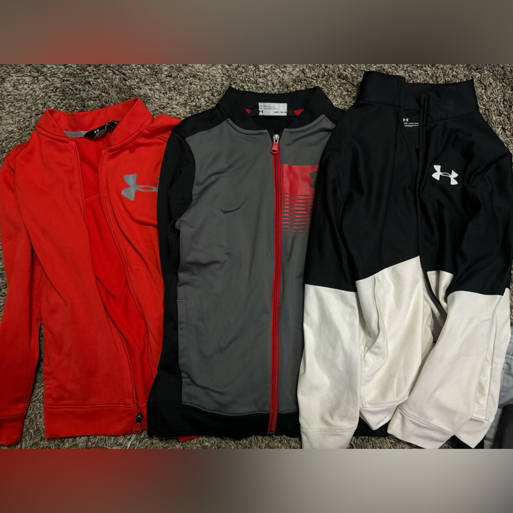 Youth size medium under armour zip up jackets